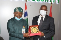 A.S. Adeleke Commandant NISS presenting a Souvenir to Rt. Hon Rotimi Amaechi