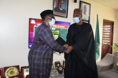 H.E. Prof Babagana Umara Zulum exchanging pleasantries with Prof M.O. Maduagwu