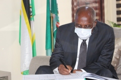 Rt. Hon Rotimi Amaechi signing the visitors register